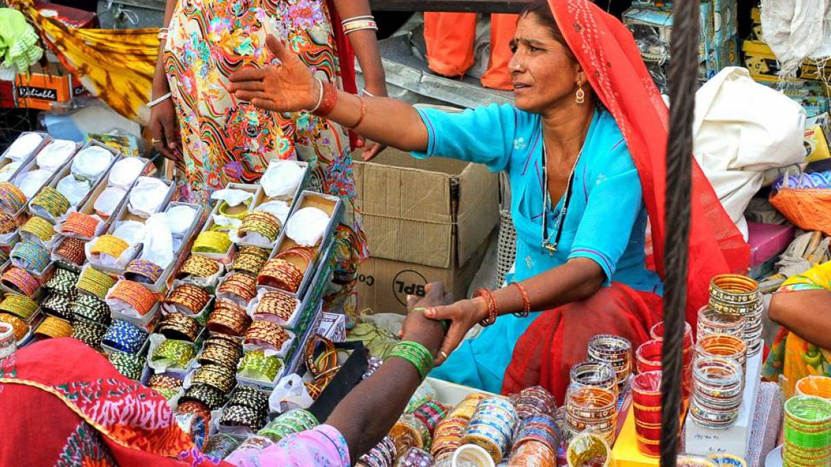 Hndlerin auf dem Basar |  Chamleon